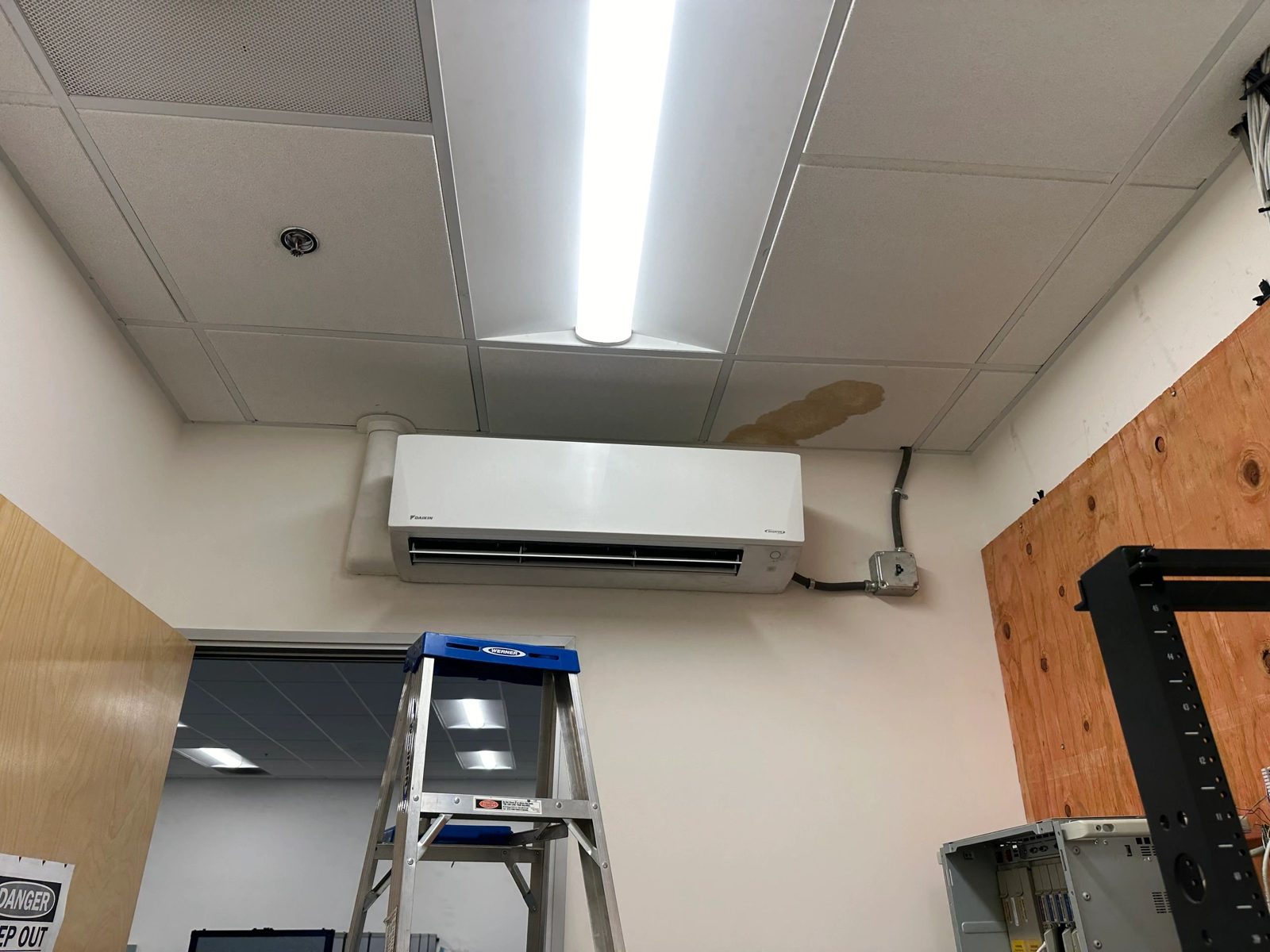 1.5 Ton Daikin mini-split indoor and outdoor units installed at a home