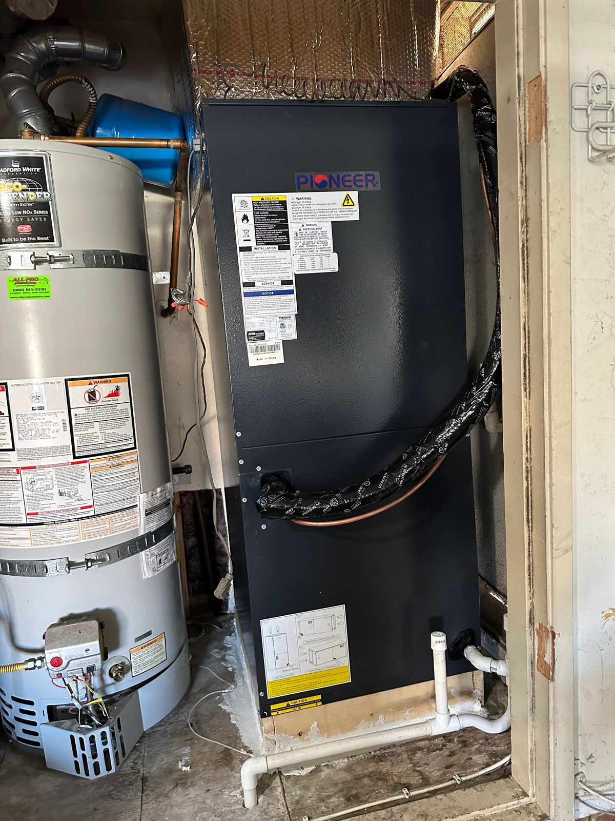 5-Ton Pioneer heat pump outdoor unit installed at a residence