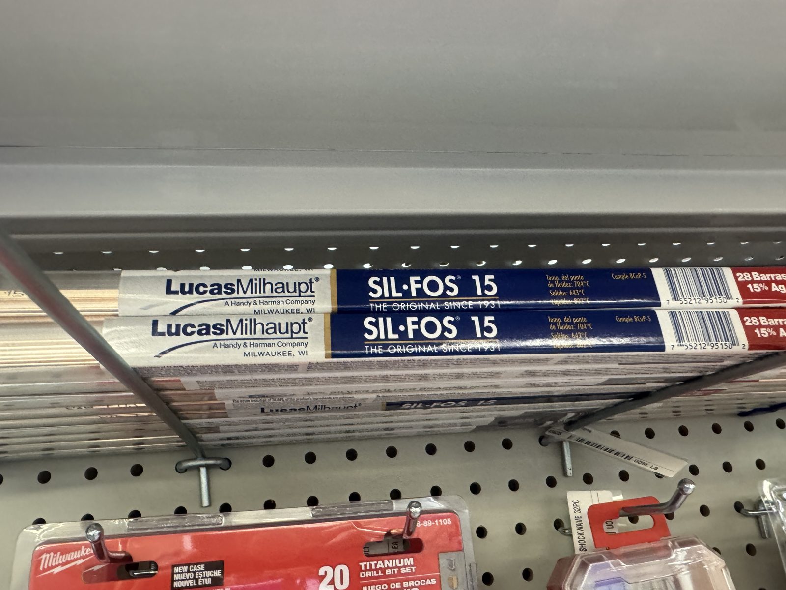 SIL-FOS 15 brazing rods on store shelf alongside drill bits for Corona new equipment installation