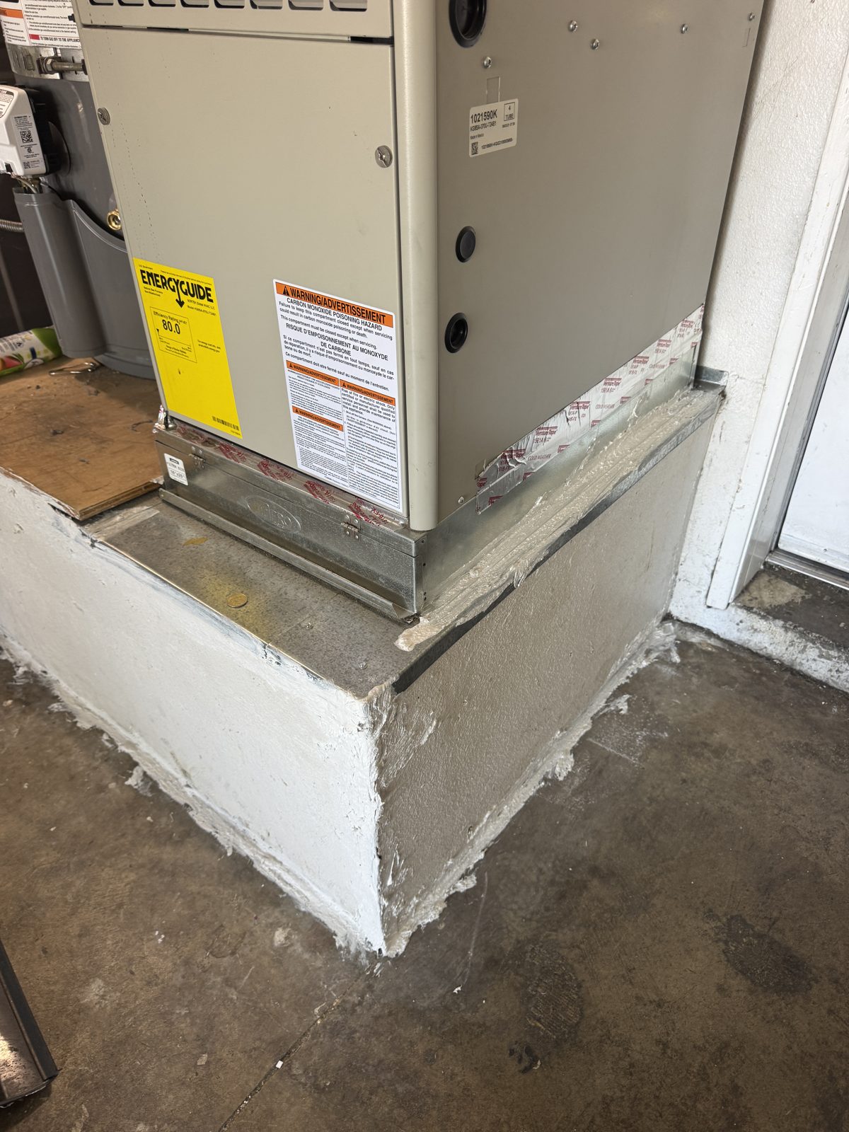 HVAC unit on concrete platform in Moreno Valley with service tools nearby
