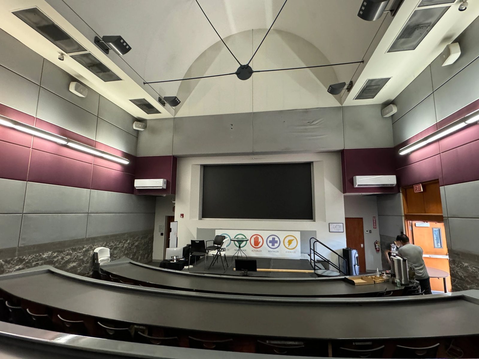 Two 3-ton TCL mini-split indoor units mounted in auditorium space