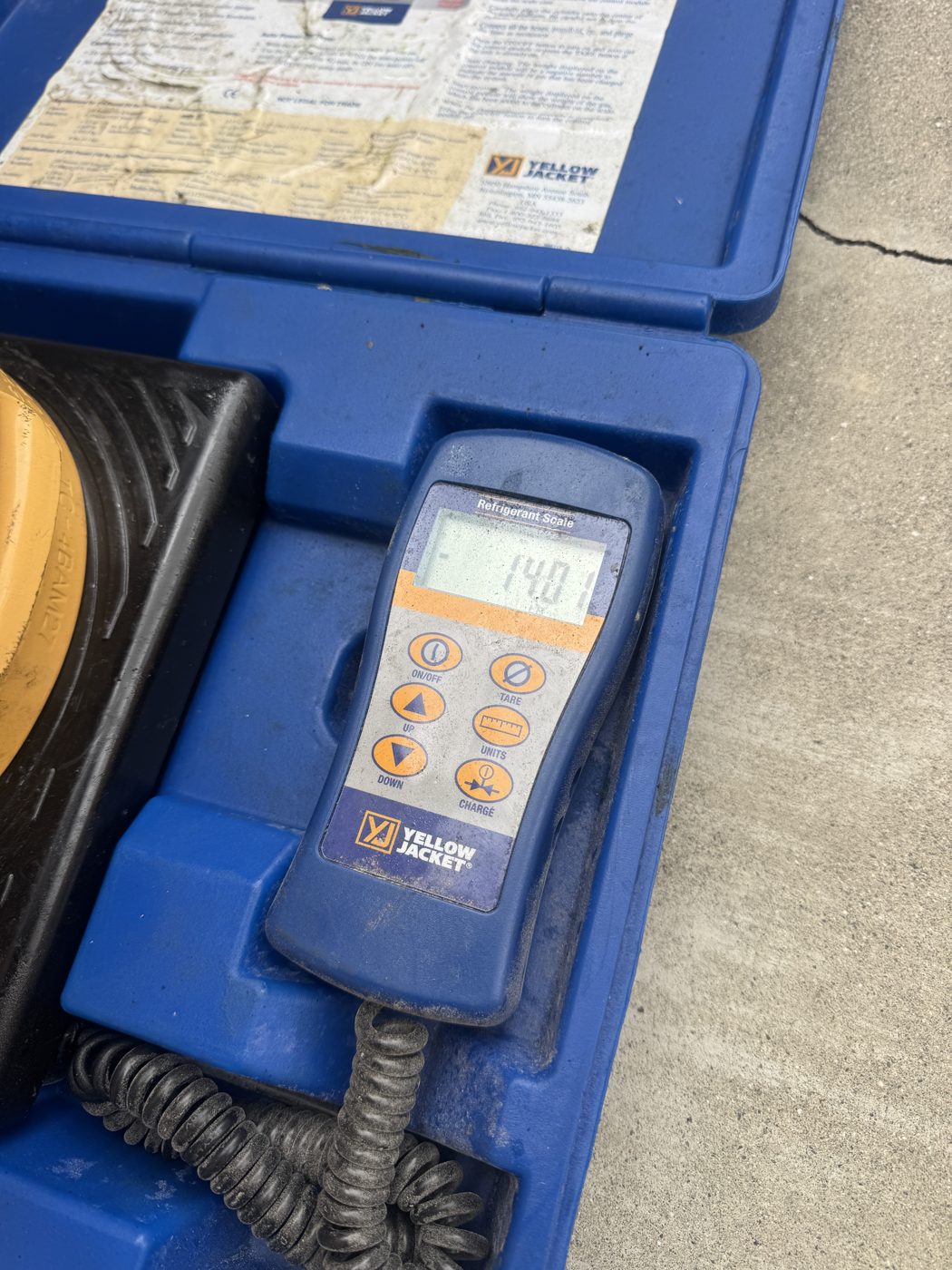 Technician installing a new air conditioner unit on a residential rooftop in Southern California